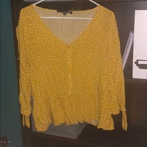 Juniors yellow polka dot top
